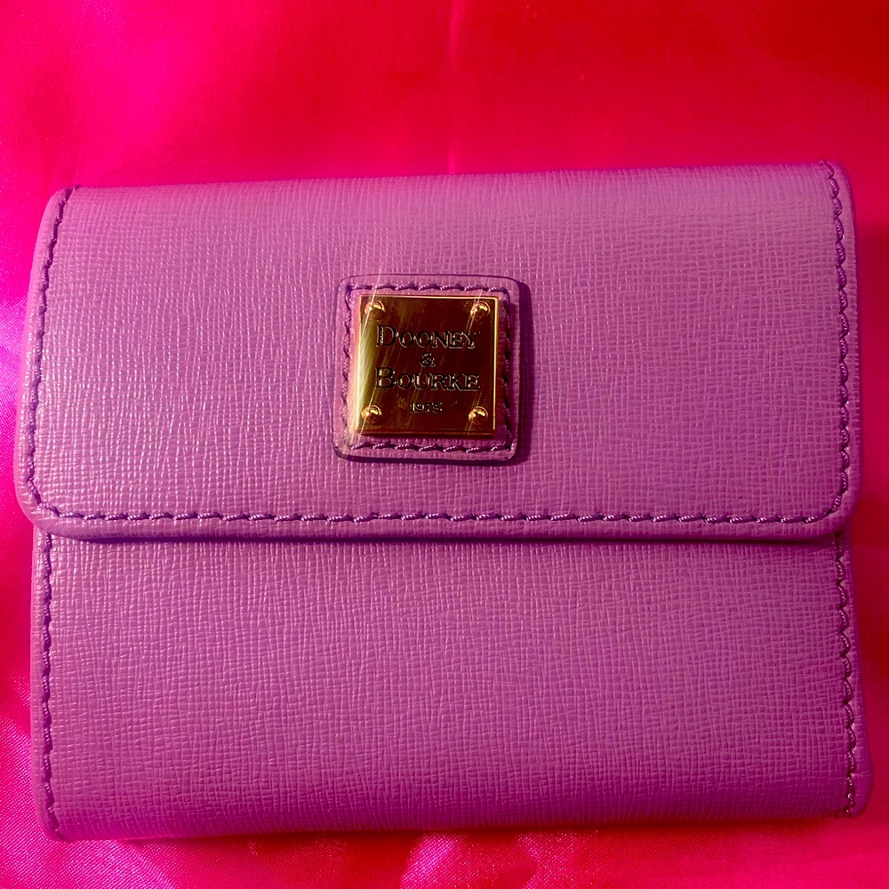 Dooney wallet never used pretty lilac color